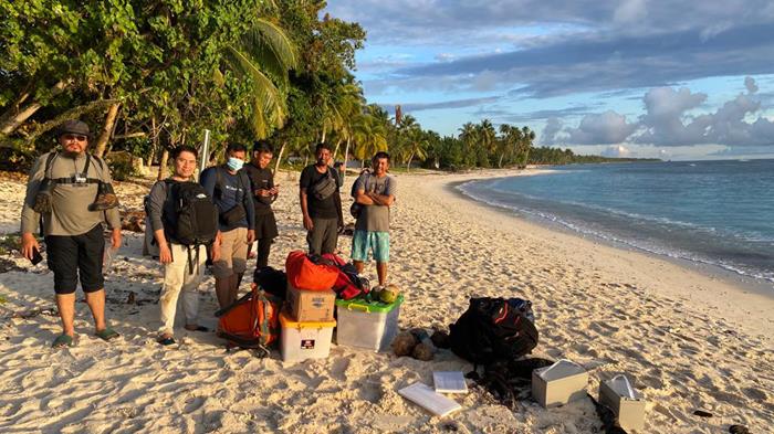 Scientists from the EOS Centre for Geohazard Observations and their collaborators waiting for their boat to ferry them to the locations of the next stations (Source: Juniator Tulius/Earth Observatory of Singapore)
