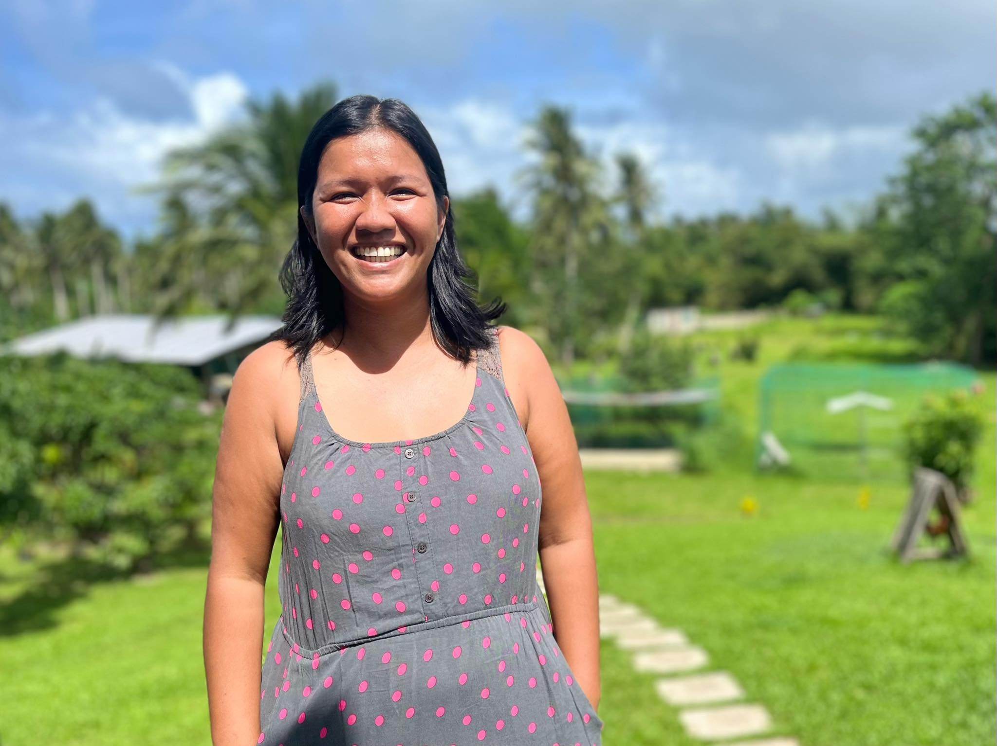 Image13_Junalyn with property in the background