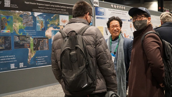 Assoc Prof Sang-Ho Yun at his poster. Assoc Prof Sang-Ho Yun at his poster.