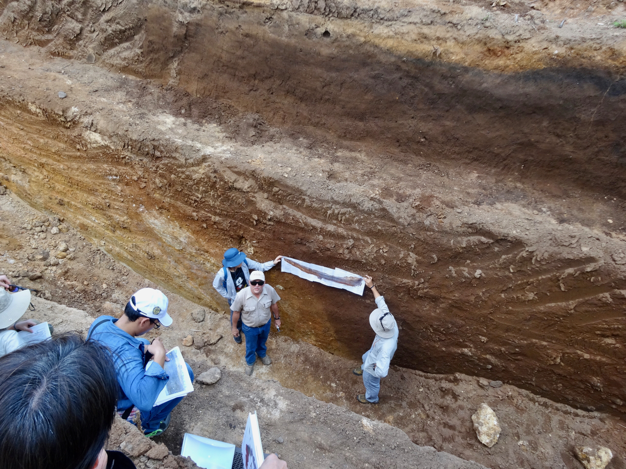 Professor Ray Weldon delivers his class lecture while standing in the Mae Chan fault (Source: Tim Dawson)