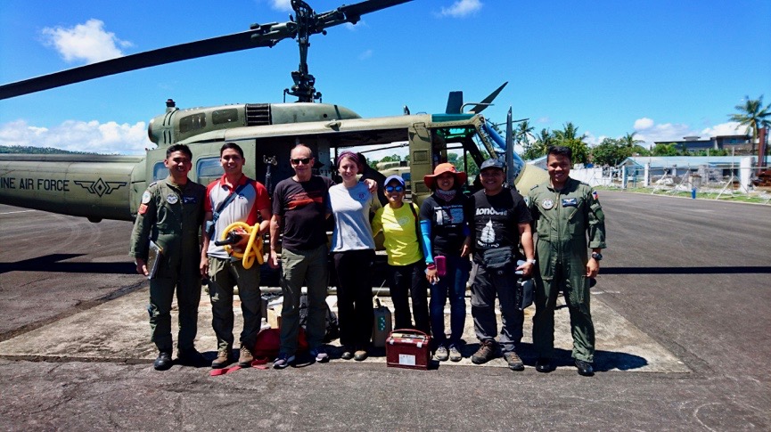 The field team: Pilot (Philippine Airforce); Ryan Rebadulla (PHIVOLCS); Dr Patrick Allard; Charlotte Barrington; Maria Barairo (PHIVOLCS); Deborah Fernandez (PHIVOLCS); Eric Arconado (PHIVOLCS); Pilot (Philippine Airforce) (Source: Charlotte Barrington) The field team: Pilot (Philippine Airforce); Ryan Rebadulla (PHIVOLCS); Dr Patrick Allard; Charlotte Barrington; Maria Barairo (PHIVOLCS); Deborah Fernandez (PHIVOLCS); Eric Arconado (PHIVOLCS); Pilot (Philippine Airforce) (Source: Charlotte Barrington)