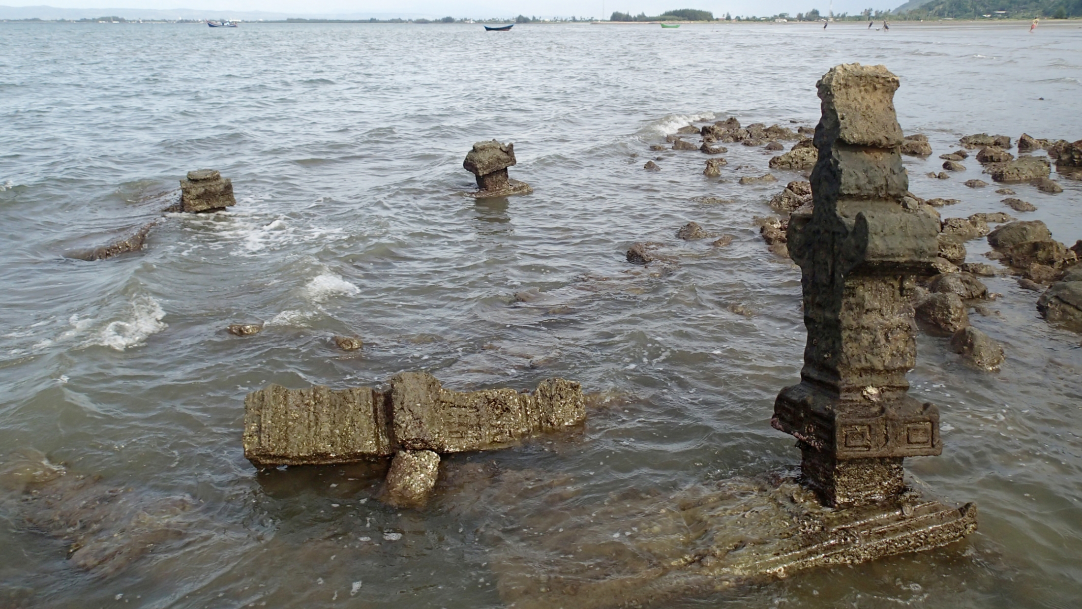 17th century gravestones now half submerged in the intertidal zone near Banda Aceh (Source: Patrick Daly/Earth Observatory of Singapore)