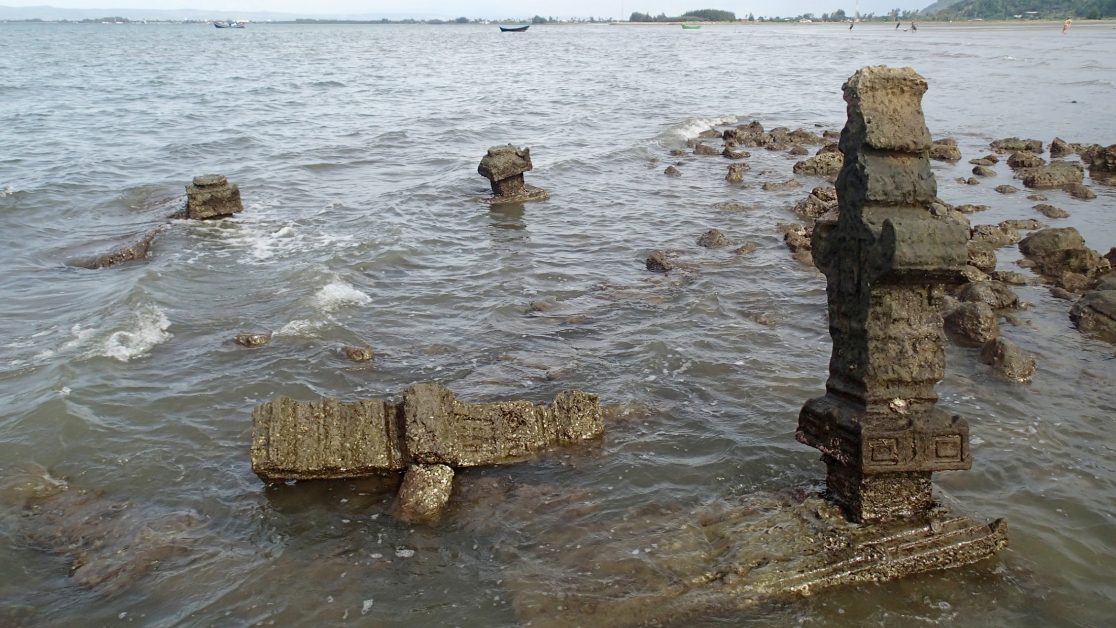 17th century gravestones now half submerged in the intertidal zone near Banda Aceh (Source: Patrick Daly/Earth Observatory of Singapore) 17th century gravestones now half submerged in the intertidal zone near Banda Aceh (Source: Patrick Daly/Earth Observatory of Singapore)