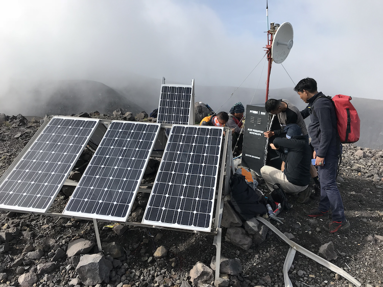 EOS and CVGHM scientists conduct maintenance at the summit station of Marapi volcano (Source: Leong Choong Yew/Earth Observatory of Singapore)