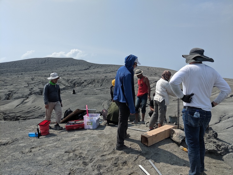 Scientists from EOS and CVGHM, in collaboration with Kyoto University, install a monitoring station at Krakatau volcano (Source: Anna Perttu/Earth Observatory of Singapore)