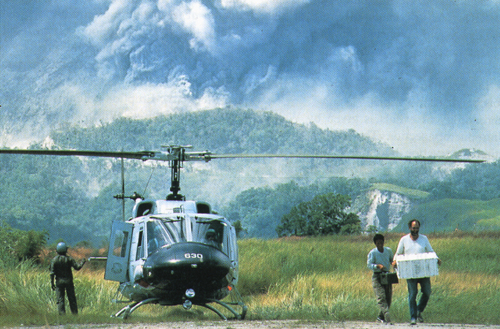 U.S. Air Force helicopter dropping off USGS and PHIVOLCS scientists and gear to be installed on the flanks of Mount Pinatubo (Source: USGS)