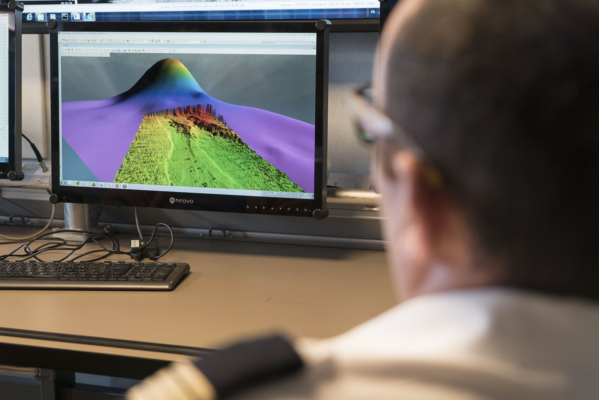 Captain Florent Landreau observes as higher resolution bathymetry fills in the blanks of previous elevation models in this area (Source: EOS/Monika Naranjo Gonzales) Captain Florent Landreau observes as higher resolution bathymetry fills in the blanks of previous elevation models in this area (Source: EOS/Monika Naranjo Gonzales)