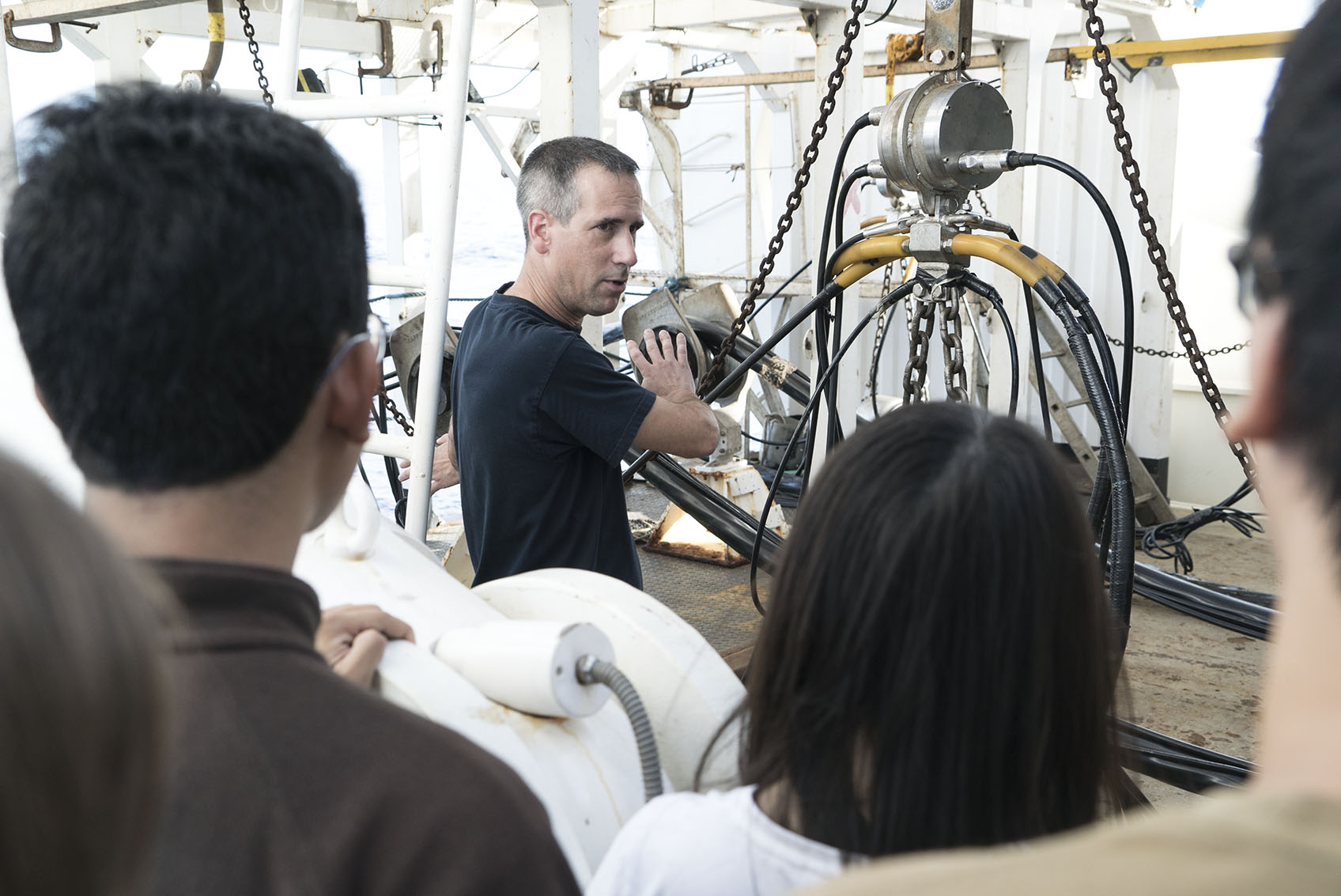 The team is introduced to the seismic gear. Genavir’s Ronan Louzaouen is part of the expert team in charge of assembling, maintaining and operating this high-pressure air gun (Source: EOS/Monika Naranjo Gonzales) The team is introduced to the seismic gear. Genavir’s Ronan Louzaouen is part of the expert team in charge of assembling, maintaining and operating this high-pressure air gun (Source: EOS/Monika Naranjo Gonzales)