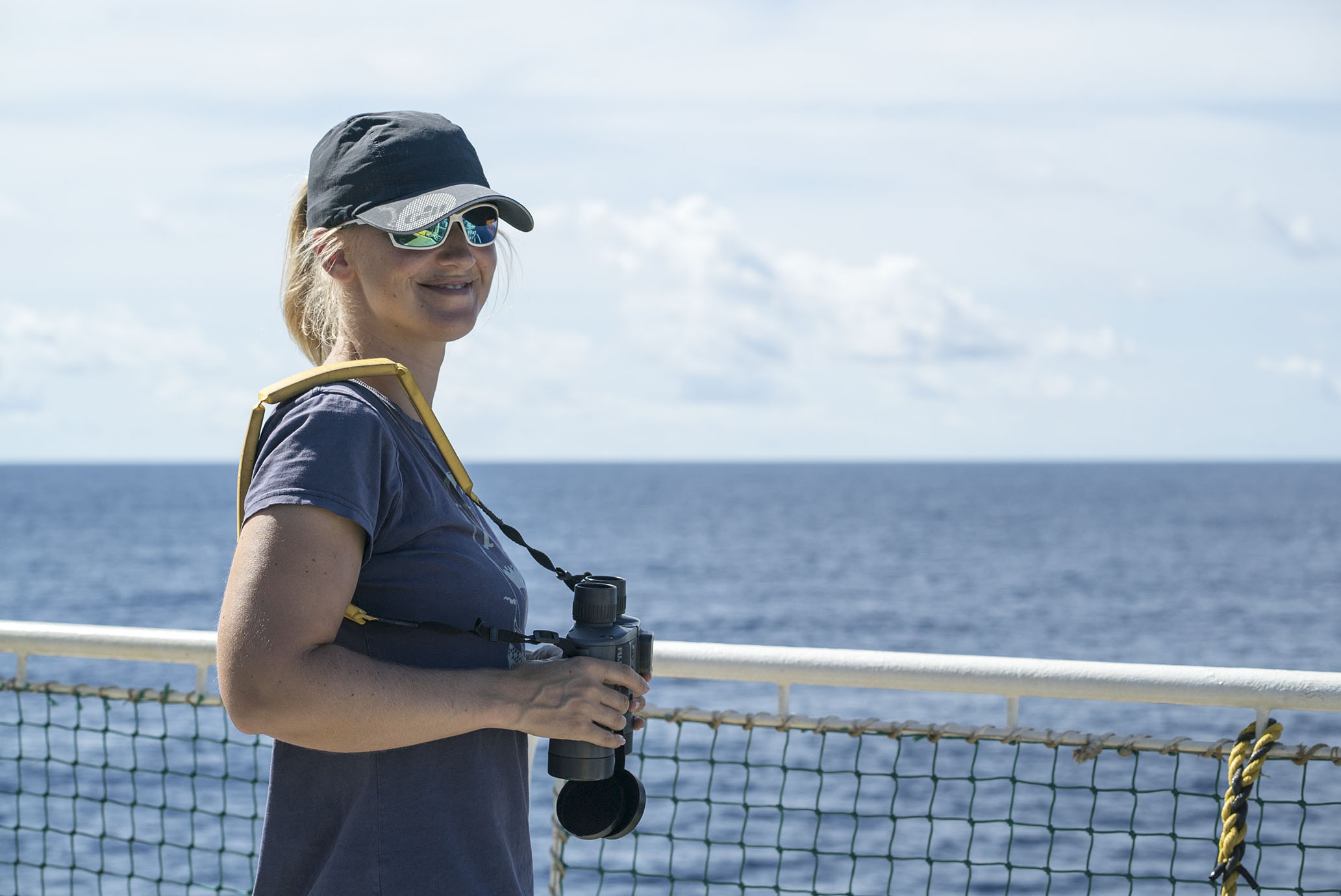Dr Rebecca Jewell observes the horizon in search for any kind of indication of marine mammals around the ships, while the air-guns are being ramped up (Source: EOS/ Monika Naranjo Gonzales) Dr Rebecca Jewell observes the horizon in search for any kind of indication of marine mammals around the ships, while the air-guns are being ramped up (Source: EOS/ Monika Naranjo Gonzales)