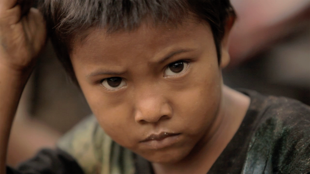 The Orang Rimba place high value on sending their children to schools as a way to increase their chances of success in the regional mainstream society (Source: Isaac Kerlow)