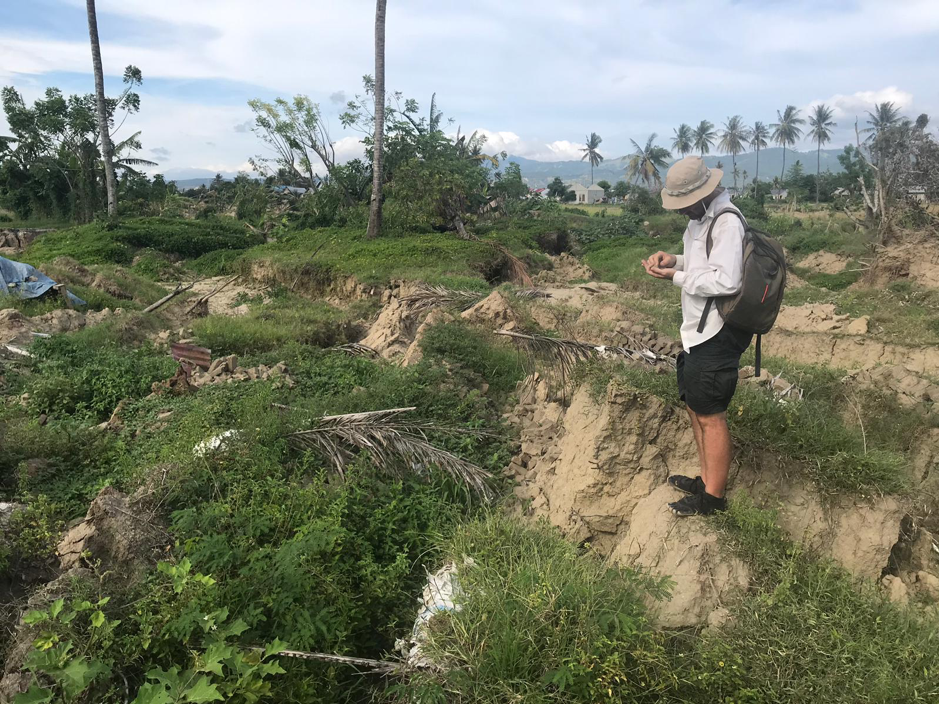 EOS Research Fellow Jedrzej Majewski at the head scarp of a slide in the Petobo sub-district in Palu (Source: Adam Switzer/ Earth Observatory of Singapore) EOS Research Fellow Jedrzej Majewski at the head scarp of a slide in the Petobo sub-district in Palu (Source: Adam Switzer/ Earth Observatory of Singapore)