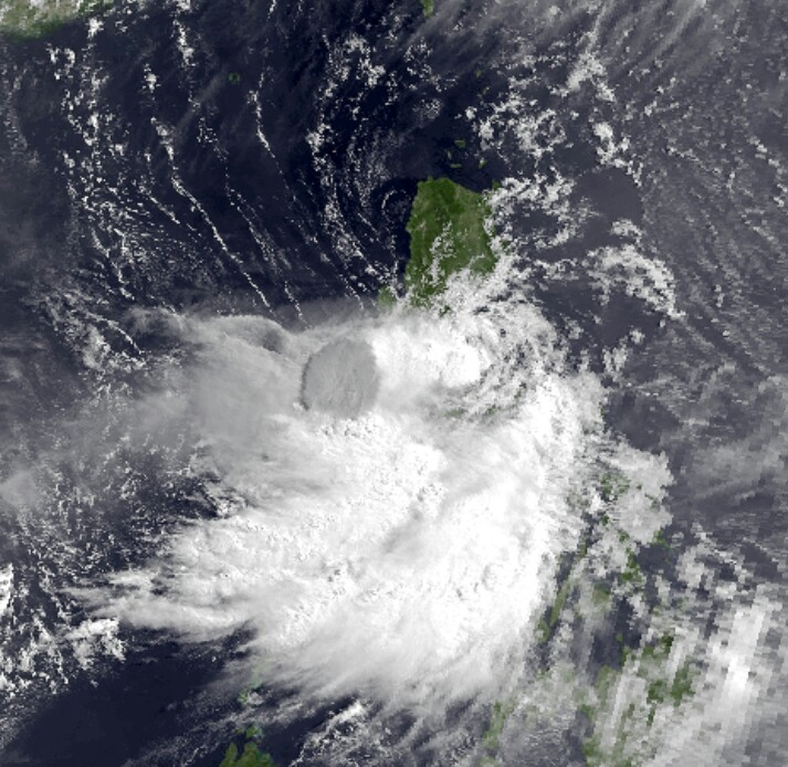Satellite image showing ash plume from the Mount Pinatubo eruption in 1991 and the wind patterns from Typhoon Yunya (Source: National Oceanic and Atmospheric Administration)