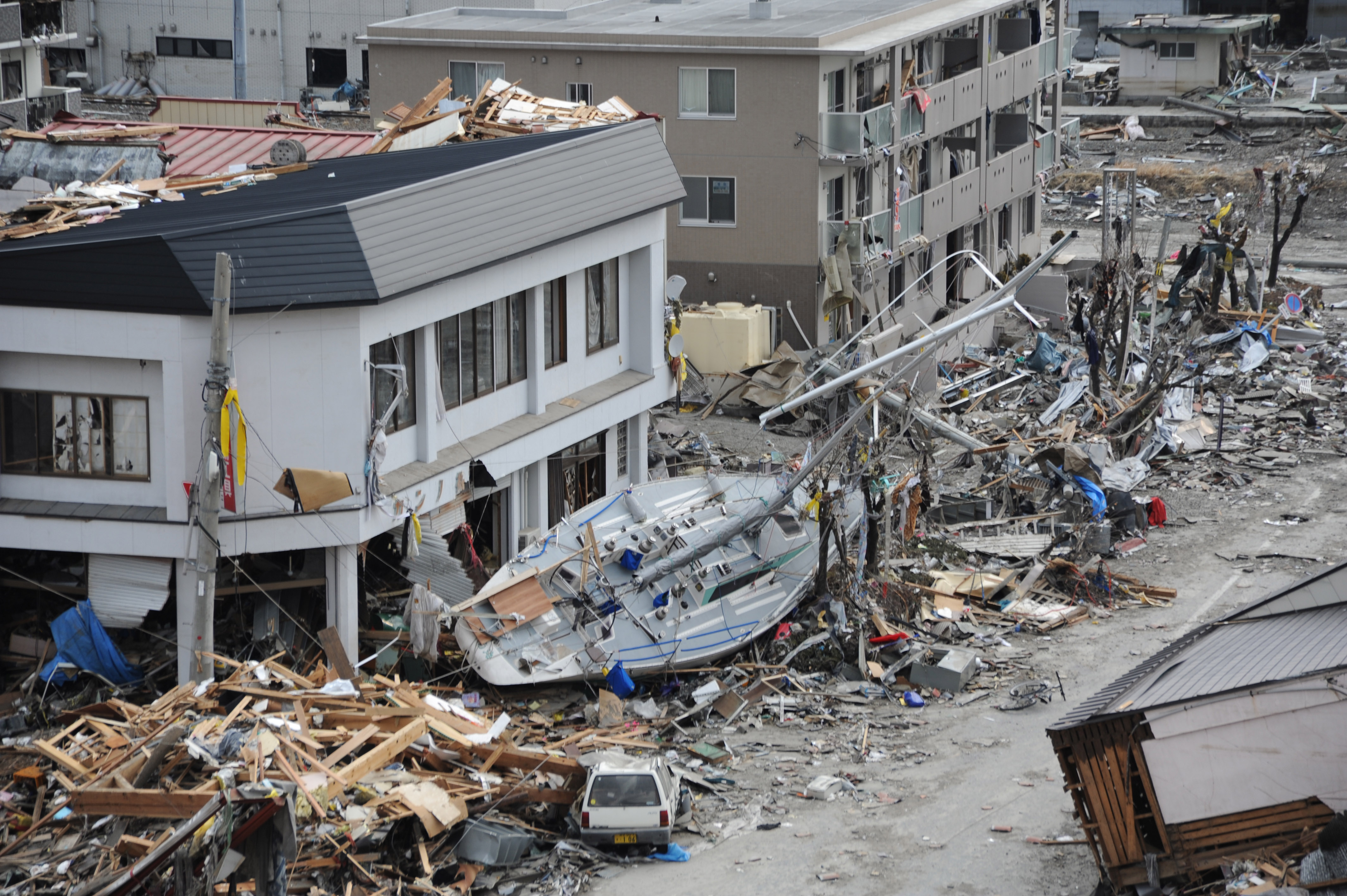 A fishing boat among the debris in Ofunato, Japan, following the 9.0-magnitude earthquake and subsequent tsunami (Source: Matthew M. Bradley/Wikimedia Commons) A fishing boat among the debris in Ofunato, Japan, following the 9.0-magnitude earthquake and subsequent tsunami (Source: Matthew M. Bradley/Wikimedia Commons)